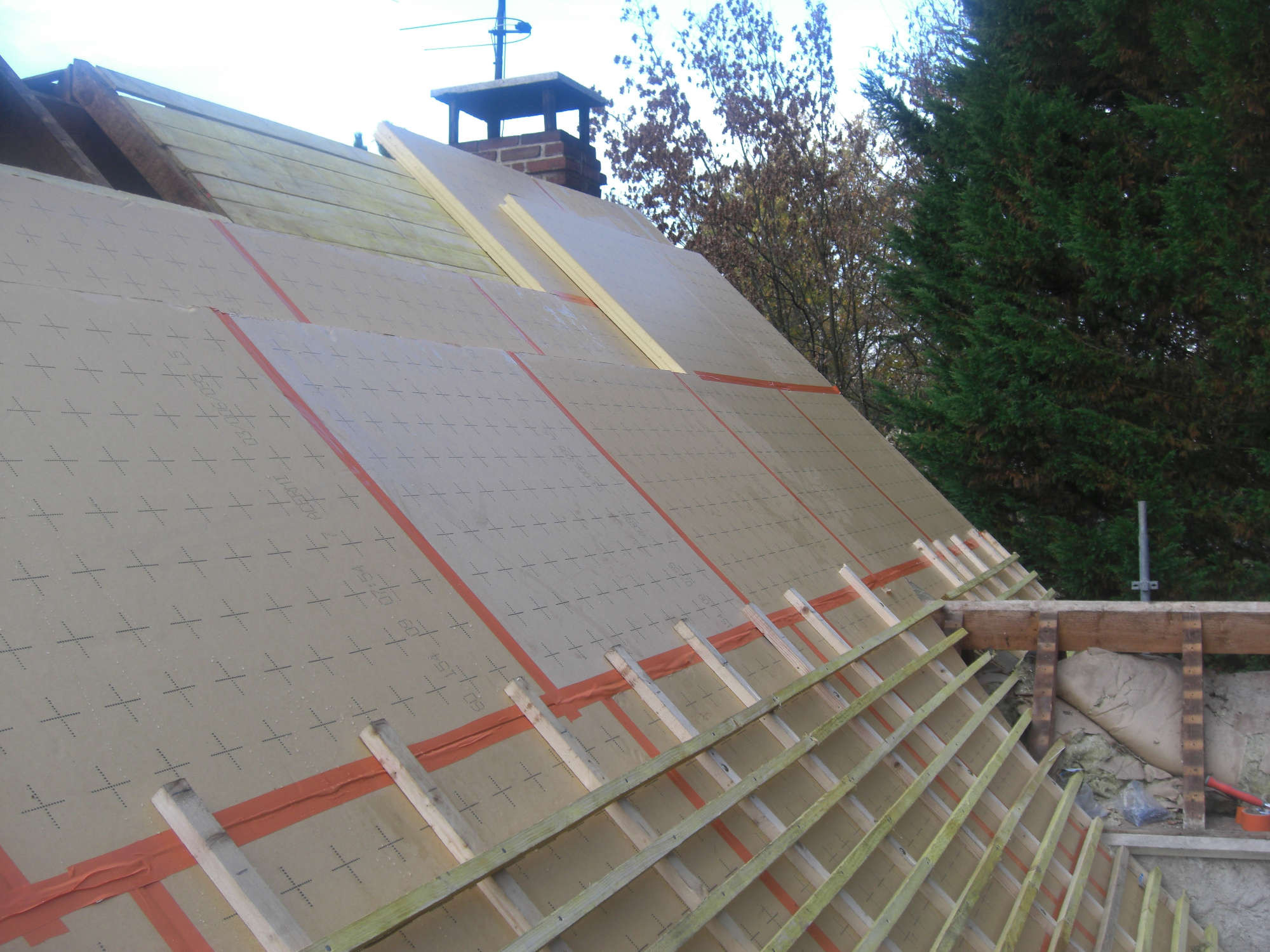 Travaux d'isolation de toiture à Croix