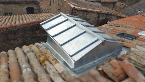 Travaux sur lucarne en zinc